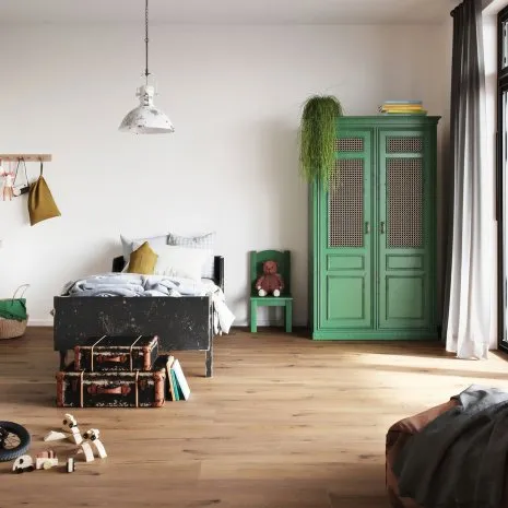 Kinderzimmer mit Bett, Spielzeug und dunklem Holzfußboden