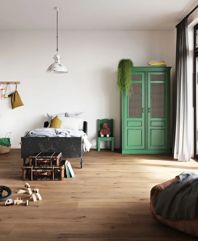 Kinderzimmer mit Bett, Spielzeug und dunklem Holzfußboden